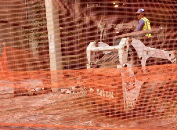 With a little help from their friends at RIOC, Island House Removes Unloved Steps Z-bricks, donated by RIOC, will soon fill in the gap created.